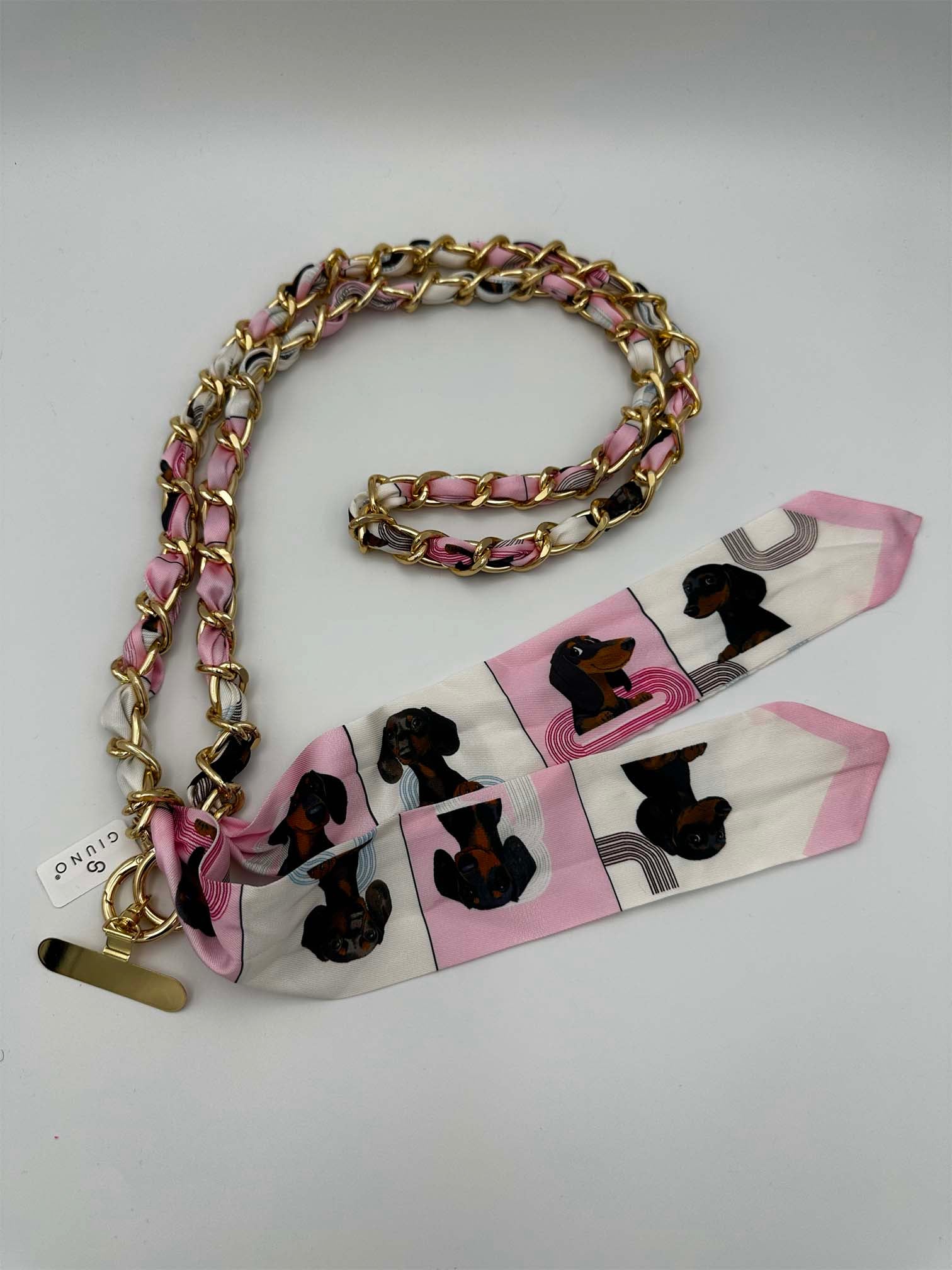 Handykette mit goldfarbener Gliederkette und Stoffband mit Dackel-Print in Rosa