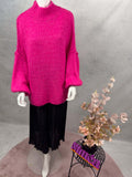 Pinkfarbener Strickpullover mit Stehkragen und Oversize Schnitt