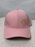 Rosa Baseball Cap mit gelb gesticktem Smiley auf der Vorderseite
