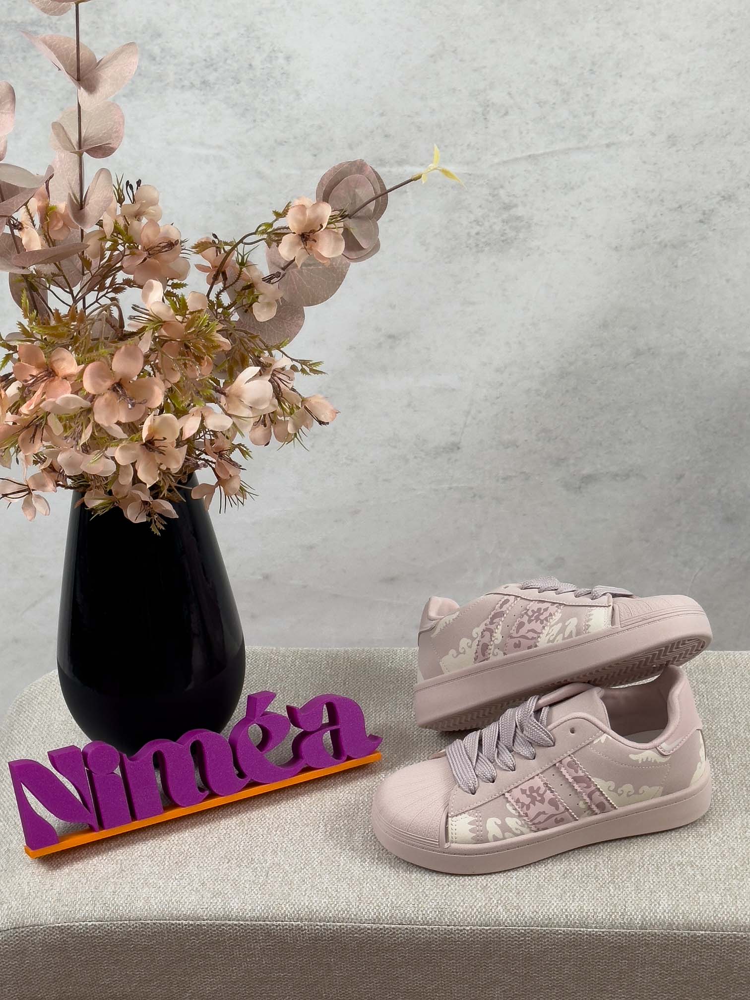 Damen Sneaker in Rosa mit Leo Muster, Schnuerung und flacher Sohle